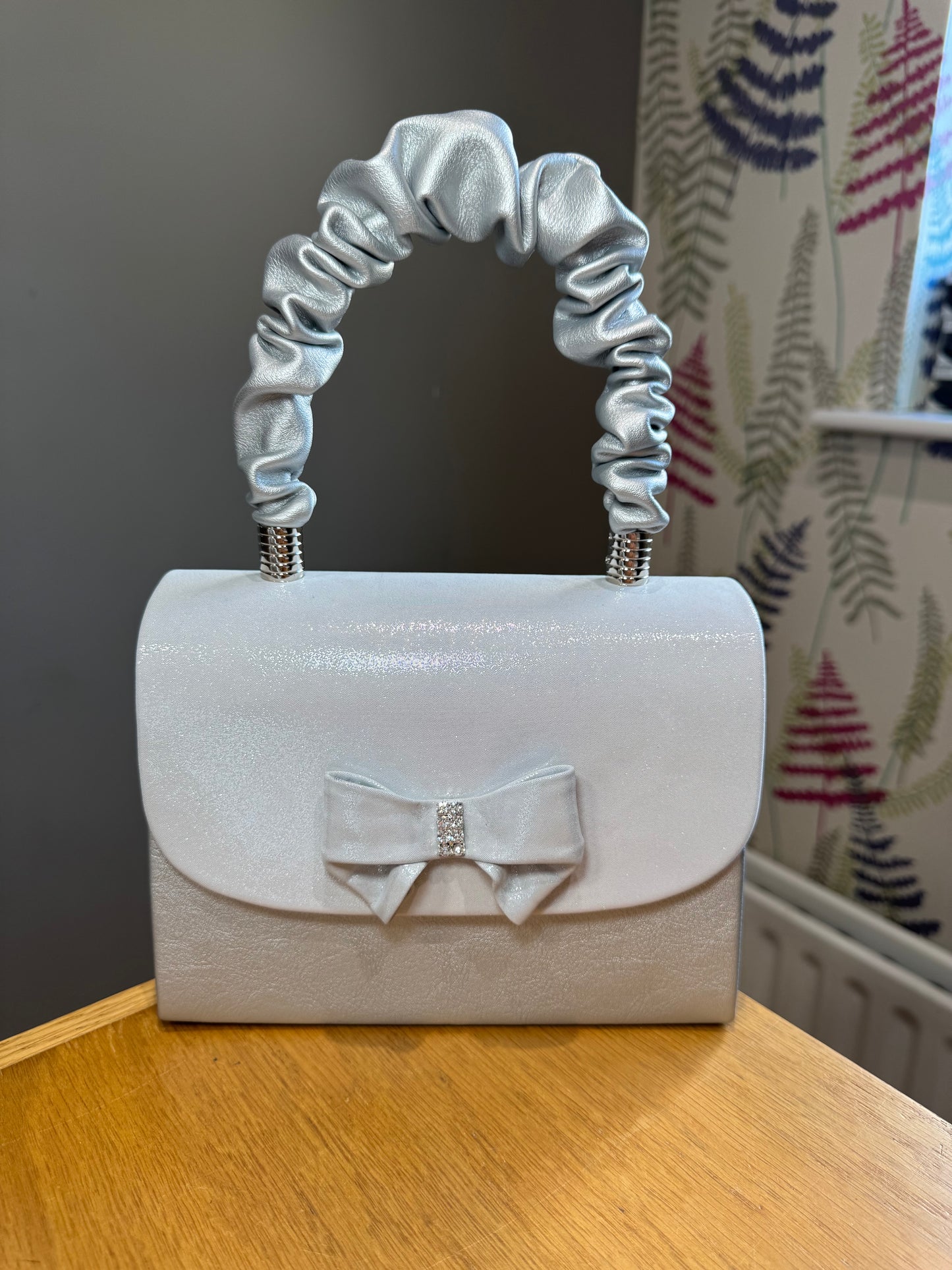 Emis Silver Shimmer Bow Box Bag